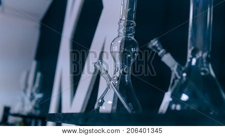 Glass Bongs For Smoking Weed Close-up Soft Focus. Smoking Accessories Marijuana