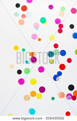 Festive party or carnival confetti on pink background