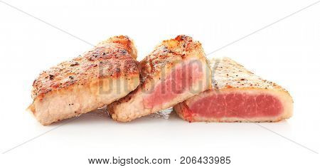 Tasty steaks on white background