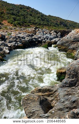Pulo Do Lobo Or Wolf's Leap Waterfall And Cascade On River Guadiana, Alentejo, Portugal