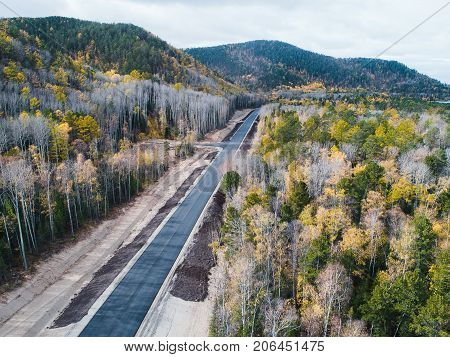 aerial view road shore water lake forest