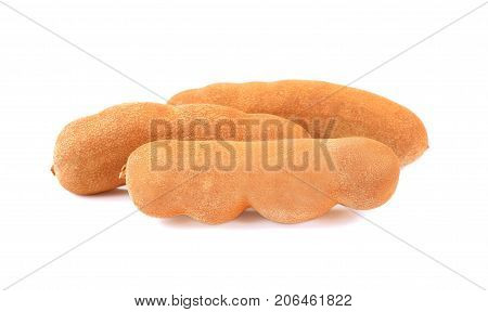 Dried tamarind fruits isolated on a white background