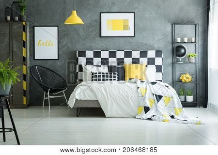 Spacious Bedroom With Yellow Accessories