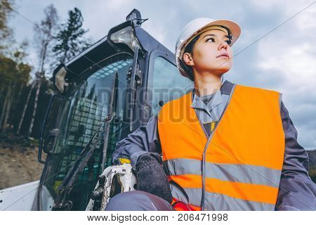 female worker road construction infrastructure repair pavement