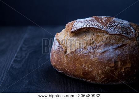 Ball of Bread on wood dark and dark background