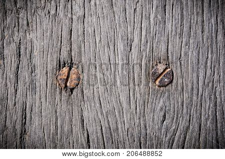 close up on wood and nail , rusty nail on wood , wood texture, rusty nail in wood background