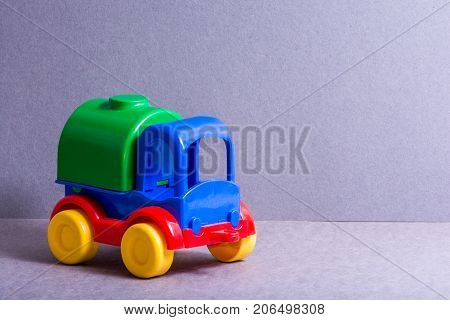 Toy truck. Toys for little children. Bright colors car.