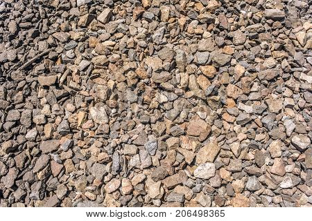 small stones rubble background texture. Building material.