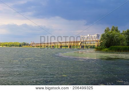 Bridge Across River Dnieper And Storm Clouds In Sky