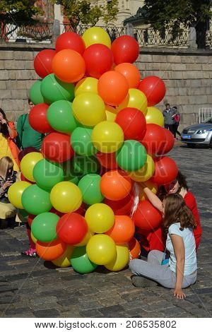 Moscow, Russia - September 23. 2017. Young girls with a balloons on Vasilyevsky spusk
