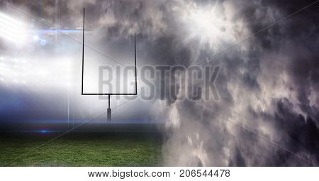 Digital composite of Sports stadium lights transition effect with dark cloud sky