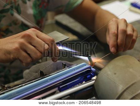Warm Flame Used By The Vetraio Artist While Modeling The Glass