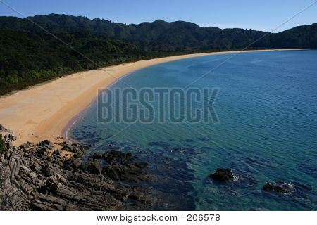 Baía de areia de ouro