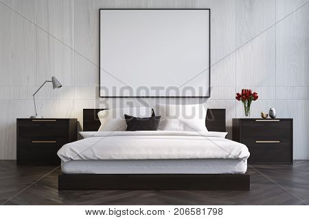White Wooden Bedroom With A Poster