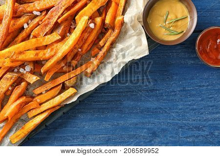 Sweet potato fries on table