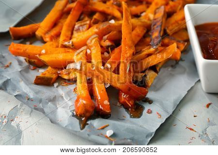 Sweet potato fries on table
