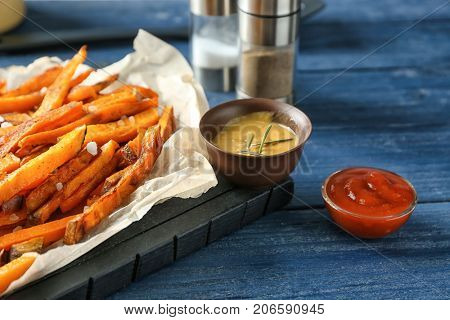 Sweet potato fries on table