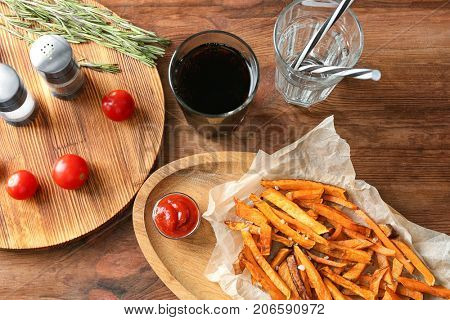 Sweet potato fries on table