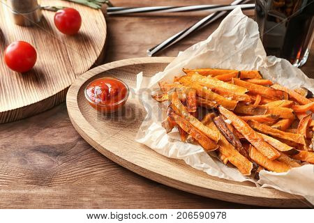 Sweet potato fries on table