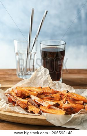 Sweet potato fries on table