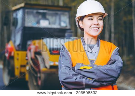 female worker road construction infrastructure repair pavement
