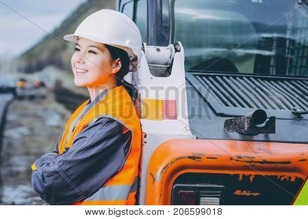 female worker road construction infrastructure repair pavement