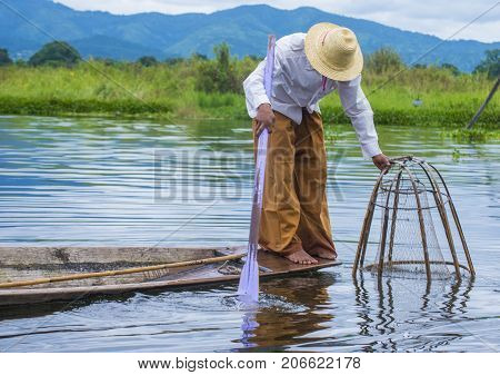 INLE LAKE MYANMAR - SEP 07 : Burmese fisherman at Inle lake Myanmar on September 07 2017 inle Lake is a freshwater lake located in Shan state