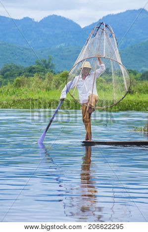 INLE LAKE MYANMAR - SEP 07 : Burmese fisherman at Inle lake Myanmar on September 07 2017 inle Lake is a freshwater lake located in Shan state