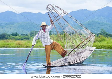 INLE LAKE MYANMAR - SEP 07 : Burmese fisherman at Inle lake Myanmar on September 07 2017 inle Lake is a freshwater lake located in Shan state