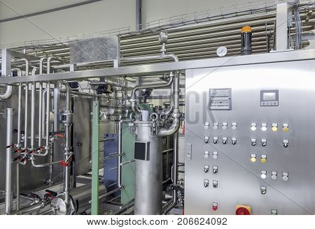 the panel with the dashboard in factory manufacture and bottling of drinks in tin cans. production and bottling of drinks in tin cans