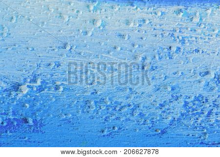 Oil paint on canvas. Blue abstract background