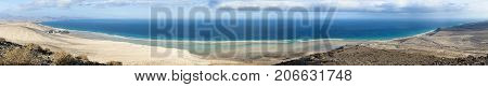Beach and and the famous lagoon at Playas De Sotavento near Risco El Paso.