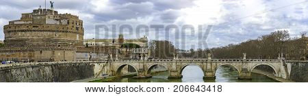 Castel Sant'angelo and Bernini's statue on the bridge Rome Italy. Palace of justice on the background.