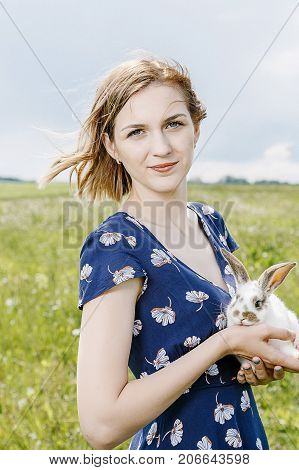 Young Girl With A Little Rabbit.