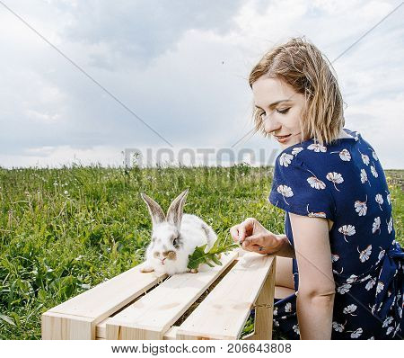 Young Girl With A Little Rabbit.