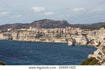 Town Of Bonifacio Clinging To The Cliffs In Corsica