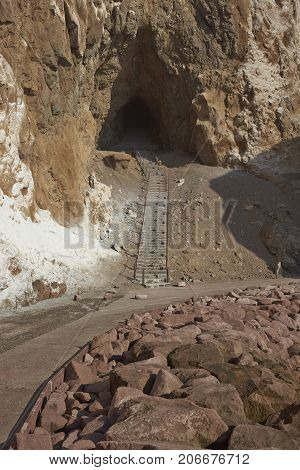 Anzota Caves at Arica on the coast of Chile. The area was used as a settlement by the Chinchorro people and later mined for guano deposited on the cliffs.