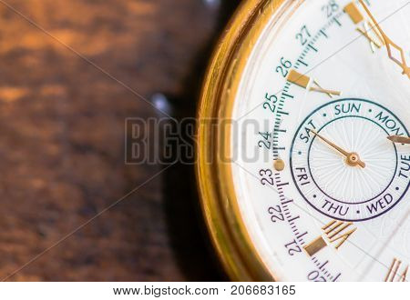 A Macro view of a gold watch.