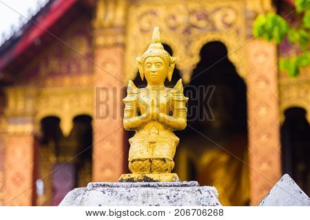 Statue Of A Buddhist Godt, Louangphabang, Laos. Close-up.