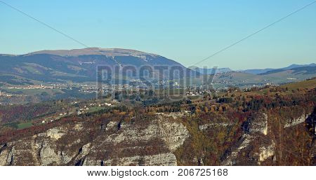 Panorama Of The Italian Mountains With The Town Of Asiago And Th