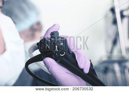 Macro of endoscopic instrument in the hands of a medical doctor