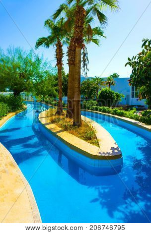 Sharm El Sheikh, Egypt - September 26, 2017: The pool lazy river at Hotel Monter Carlo Sharm Resort and SPA at Sharm El Sheikh, Egypt on September 26, 2017