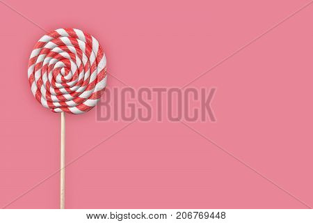 background with a round striped lollipop on pink 3d
