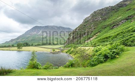 A landscape view of Crummock Water one of the lakes in the Lake District Cumbria United Kingdom.