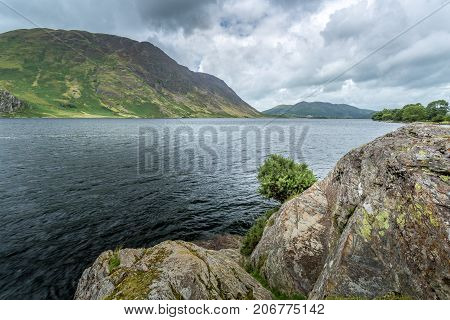 A landscape view of Crummock Water one of the lakes in the Lake District Cumbria United Kingdom.