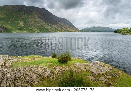 A landscape view of Crummock Water one of the lakes in the Lake District Cumbria United Kingdom.