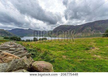 A landscape view of Crummock Water one of the lakes in the Lake District Cumbria United Kingdom.
