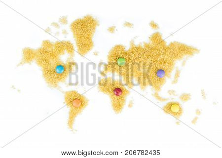 Map Of The World Made Of Cane Sugar With Multicoloured Choco Lentils