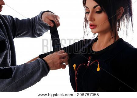 Trainer Helps Attaching Ems