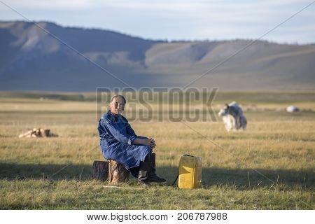 huvsgul Mongolia September 6th 2017: mongolian woman resting outside her ger